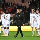 MK Dons will discover their Papa John’s Trophy opponents on Saturday