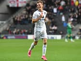 Scott Twine celebrates his stunning free-kick against Cambridge United last month
