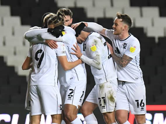 MK Dons celebrate Tennai Watson’s goal against Plymouth