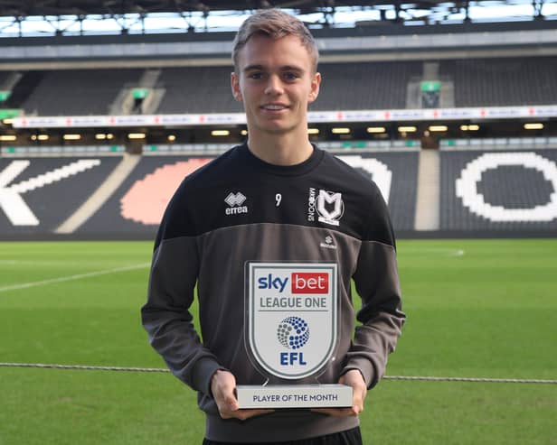 Scott Twine with his Player of the Month trophy after winning the prize for November