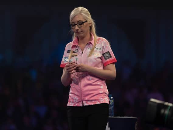 Fallon Sherrock was beaten in the first round of the World Championships. Pic: Lawrence Lustig (PDC)