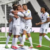 MK Dons are set to return to action over the festive period with a trip to Lincoln on Boxing Day before home games against Cheltenham and Gillingham