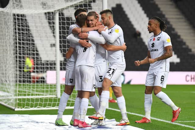 <p>MK Dons are set to return to action over the festive period with a trip to Lincoln on Boxing Day before home games against Cheltenham and Gillingham</p>