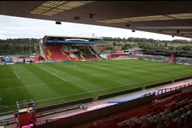 MK Dons fans will travel to Sincil Bank on Boxing Day