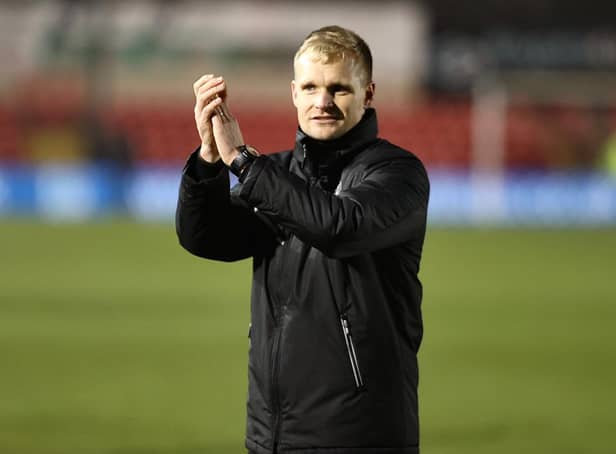 <p>A relieved Liam Manning after the enthralling 3-2 win over Lincoln City on Boxing Day</p>
