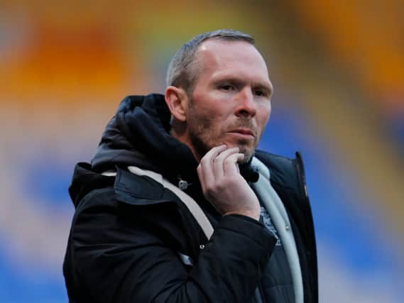 Lincoln City boss Michael Appleton said his side needed picking up after throwing away a 2-0 lead to lose 3-2 to MK Dons on Boxing Day