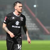 Josh McEachran put in one of his best performances in a Dons shirt at Lincoln on Boxing Day