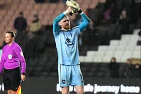 Andrew Fisher’s departure from MK Dons has been confirmed, signing for Swansea City