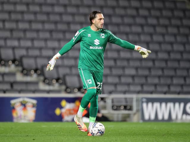 <p>Franco Ravizzoli was delighted to make his first league start for MK Dons in the 1-0 win over AFC Wimbeldon</p>