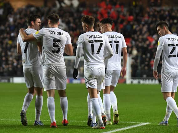 MK Dons celebrate Matt O‘Riley’s seventh goal of the season which turned out to be the winner against AFC Wimbledon
