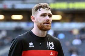 Andrew Fisher left Dons on Tuesday for Swansea City