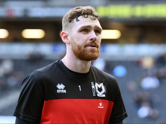 <p>Andrew Fisher left Dons on Tuesday for Swansea City</p>