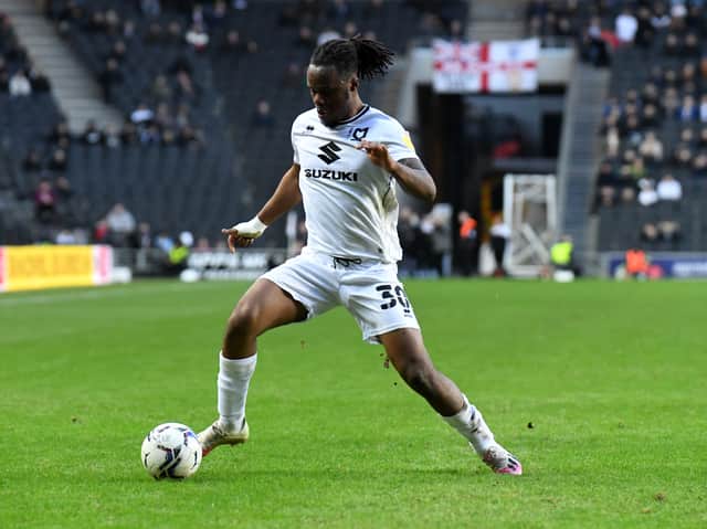 <p>Peter Kioso in action for MK Dons</p>