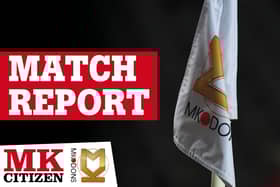 MK Dons beat Wycombe Wanderers at Adams Park in a fiery and controversial encounter 