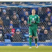 Jamie Cumming made a strong start to life at MK Dons with a great showing against Portsmouth at Fratton Park
