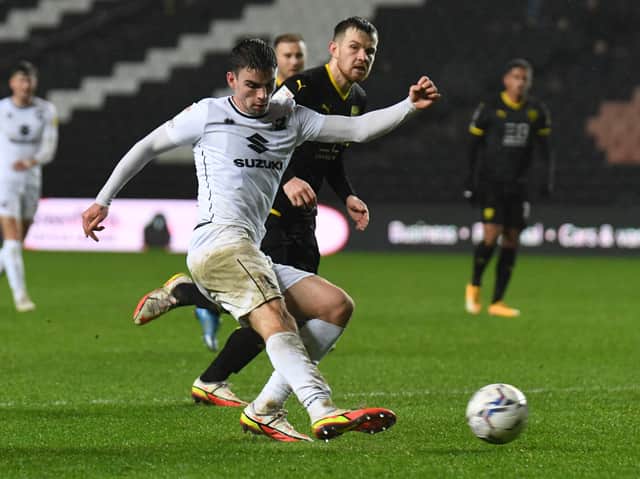 <p>Matt O’Riley signed a long-term deal at Celtic Park after the Bhoys met his release clause on Wednesday - and that money will be reinvested into MK Dons’ squad</p>
