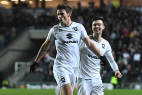 Matt O’Riley celebrates his goal against AFC Wimbledon in what turned out to be his penultimate game for MK Dons