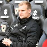 Liam Manning said he is not trying to mould MK Dons into a squad in his vision but one for the long-term view of the club