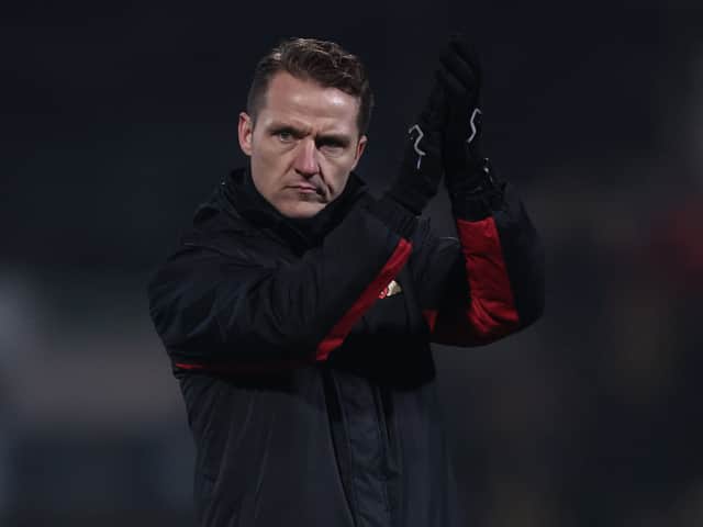 <p>Doncaster Rovers manager Gary McSheffrey might want to get a dog after his side beat MK Dons on Saturday</p>
