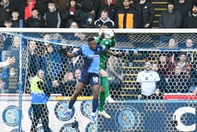 An assured performance from Jamie Cumming in goal helped MK Dons to their second clean sheet on the bounce