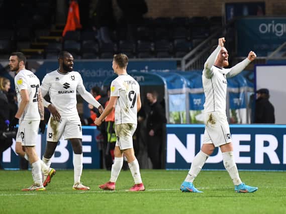 MK Dons celebrate their win over Wycombe Wanderers on Saturday