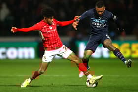 Kaine Kesler, in action here for Swindon, is in position to make an immediate impact for MK Dons according to Liam Manning. Matt Smith and Dan Kemp are also fit to play straight away.