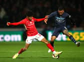 Kaine Kesler, in action here for Swindon, is in position to make an immediate impact for MK Dons according to Liam Manning. Matt Smith and Dan Kemp are also fit to play straight away.
