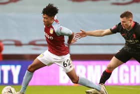 Kaine Kesler, shown here making his debut for Aston Villa against Liverpool, believes his style will suit MK Dons