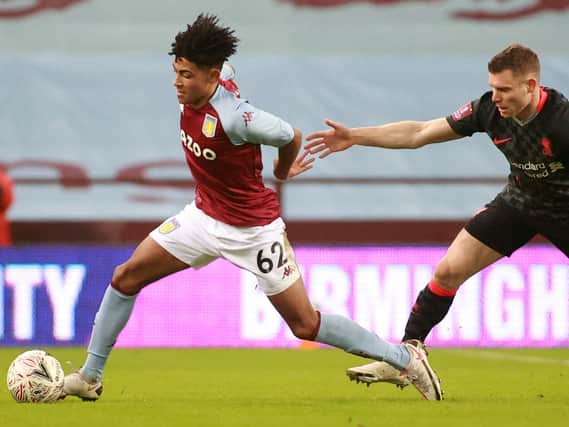 Kaine Kesler, shown here making his debut for Aston Villa against Liverpool, believes his style will suit MK Dons