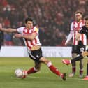 Scott Twine’s strike on the hour got MK Dons back in the game at Sincil Bank, having trailed 2-0 after just eight minutes. Dons went on to beat Lincoln City 3-2, with Twine scoring the winner in stoppage time