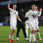 MK Dons celebrate their win over Wycombe Wanderers last time out
