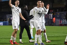 MK Dons celebrate their win over Wycombe Wanderers last time out