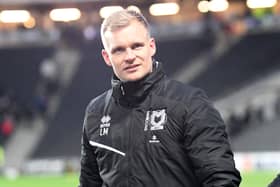 Liam Manning said he enjoyed the game between his MK Dons side and Ipswich Town and was pleased with a point