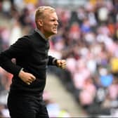 Liam Manning celebrates Troy Parrott’s goal in his first MK Dons game in charge, against Sunderland back in August