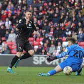 Connor Wickham needed just two minutes on the field before he coolly slotted past Anthony Patterson to restore Dons’ lead against his former club Sunderland