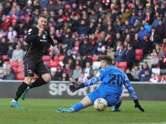 Connor Wickham needed just two minutes on the field before he coolly slotted past Anthony Patterson to restore Dons’ lead against his former club Sunderland