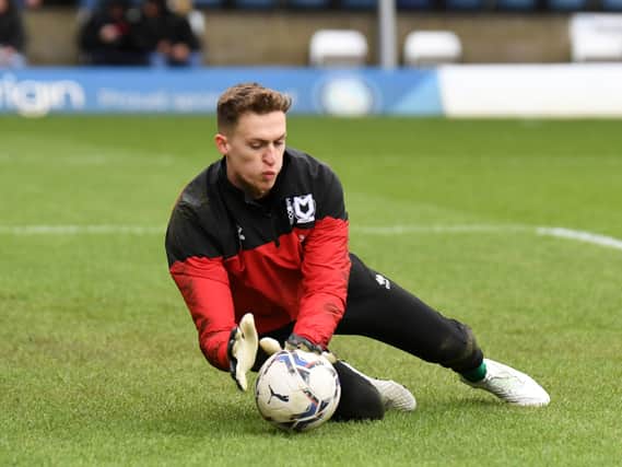 Jamie Cumming, on loan from Chelsea, said the difference between his time at Gillingham and MK Dons is polar opposite