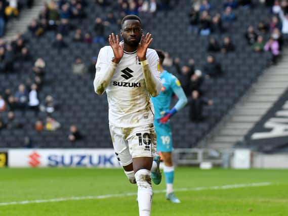 Mo Eisa celebrates his ninth goal of the season but his first at Stadium MK since August as he opens the scoring against Bolton