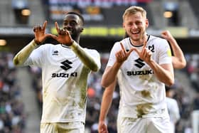 Mo Eisa and Harry Darling celebrate against Bolton Wanderers