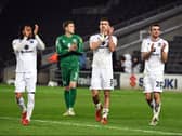 David Kasumu, Jamie Cumming, Warren O’Hora and Troy Parrott after Tuesday night’s win over Cheltenham