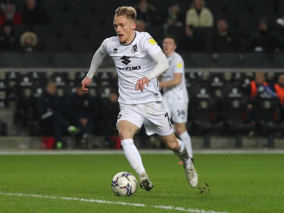Matt Smith said he has to bide his time to get more first team opportunities for MK Dons. He made the switch from Manchester City on deadline day but has made just two appearances for Dons.