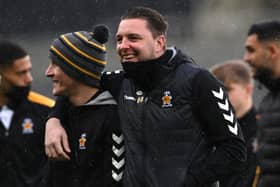 Cambridge United manager Mark Bonner with former MK Dons defender George Williams. Bonner called Dons one of the best teams in League One ahead of the game on Saturday.