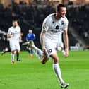 Troy Parrott celebrates his first goal since November, coming against Cheltenham Town last week. The Irishman has been called up to represent his country again