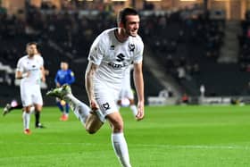 Troy Parrott celebrates his first goal since November, coming against Cheltenham Town last week. The Irishman has been called up to represent his country again