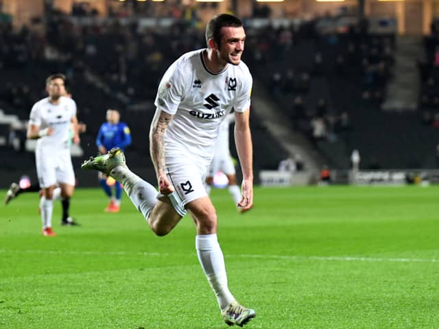 Troy Parrott celebrates his first goal since November, coming against Cheltenham Town last week. The Irishman has been called up to represent his country again