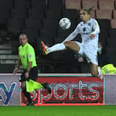 Tennai Watson get airborne the last time MK Dons appeared on Sky Sports, during the 1-1 draw with Plymouth in December. Their Good Friday game against Sheffield Wednesday will be moved to Saturday April 16 at 7.45pm.