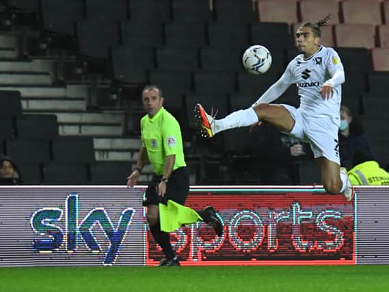Tennai Watson get airborne the last time MK Dons appeared on Sky Sports, during the 1-1 draw with Plymouth in December. Their Good Friday game against Sheffield Wednesday will be moved to Saturday April 16 at 7.45pm.