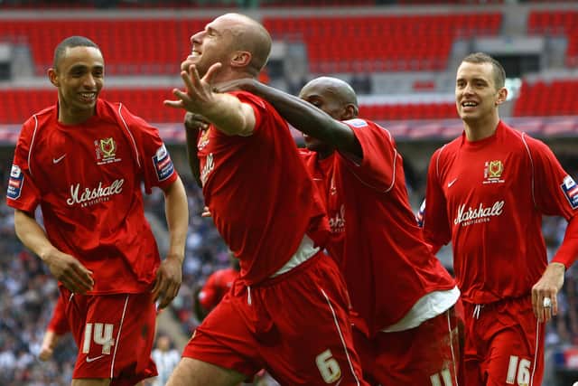 Wilbraham, right, was a part of MK Dons’ squad which won the double in 2007/08. Wednesday marked the 14th anniversary of their 2-0 win over Grimsby at Wembley to win the Johnstone’s Paint Trophy