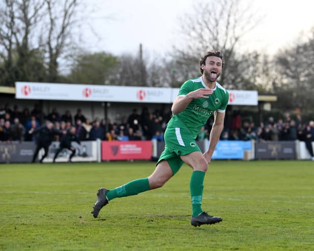 James Sage celebrates his winning penalty for Newport Pagnell Town. They will go to Wembley in May for the FA Vase final