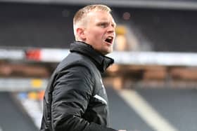 Liam Manning said there is no extra pressure on his side despite climbing into the automatic spots on Tuesday night after beating Crewe Alexandra